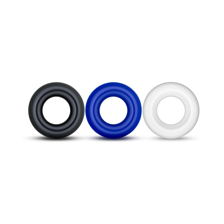 Set of three silicone donut rings in black, blue, and white, designed for comfort and performance enhancement.
