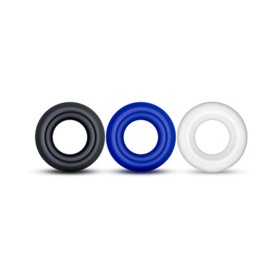 Set of three silicone donut rings in black, blue, and white, designed for comfort and performance enhancement.