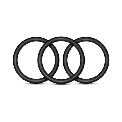Set of three medium black silicone performance rings arranged side by side on a white background.