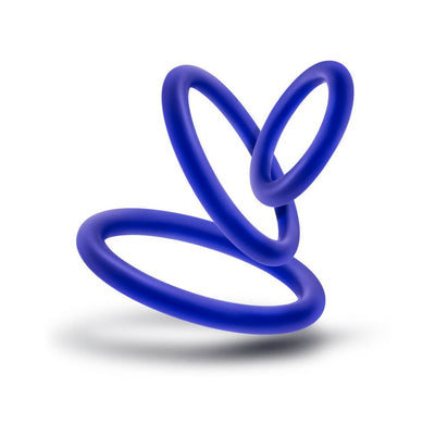 Set of three blue silicone cock rings in varying sizes displayed on a white background with soft shadow.