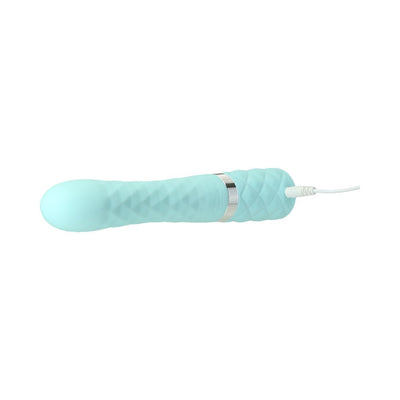 Light blue textured dual stimulator with a curved shaft and USB charging cable attached.