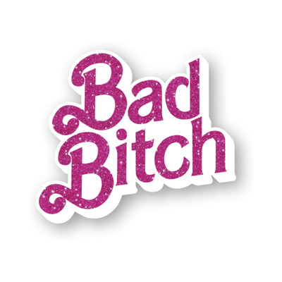 Pink glittery "Bad Bitch" enamel pin with bold, playful script and white outline on a white background.