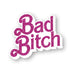 Pink glittery "Bad Bitch" enamel pin with bold, playful script and white outline on a white background.