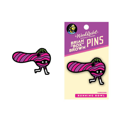 Pink and black striped enamel pin of an anthropomorphic running pipe with eyes and legs, displayed on branded Wood Rocket backing card.