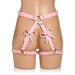 Pink faux leather thigh harness with decorative bows displayed on a mannequin lower torso.