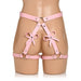 Pink faux leather bondage thigh harness with adjustable straps and decorative bows on a mannequin.