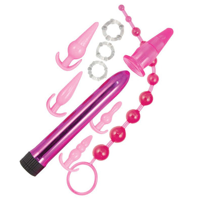 Pink Elite Collection 10-piece anal play kit with vibrator, multiple butt plugs, anal beads, and three clear cock rings.