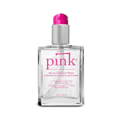 Clear glass 4 oz bottle of Pink Silicone Lubricant for women with pink pump and label, enriched with Vitamin E and Aloe Vera.
