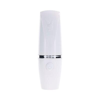White Playboy Getaway discreet tapping toy with silver accent and power button, designed like a lipstick case.