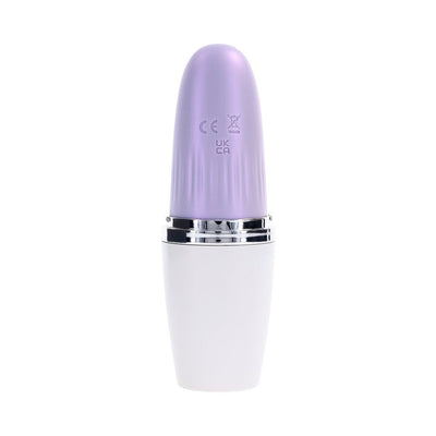 Compact white and opal purple travel-friendly tapping toy with a sleek, lipstick-inspired design.