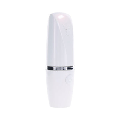 Compact white Playboy Getaway tapping toy with sleek lipstick-style design and power button on base.