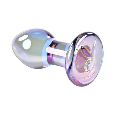 Iridescent glass butt plug with tapered teardrop shape and flared base featuring a subtle rabbit head design.