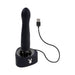 Black silicone vibrator with textured shaft on a charging base featuring a Playboy bunny logo and USB charging cable.