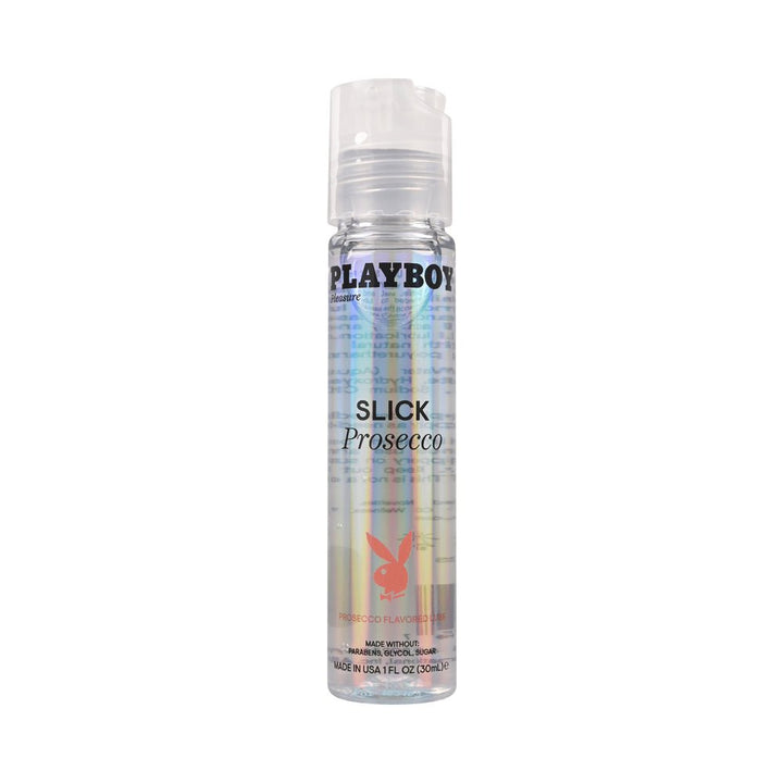 Clear 1oz bottle of Playboy Slick Prosecco flavored water-based lubricant with iridescent label and flip-top cap.
