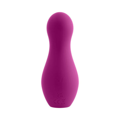 Purple silicone clitoral tapping toy with smooth rounded head and Playboy logo on the base.