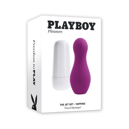 Playboy The Jet Set Tapping Wild Aster silicone travel massager with white charging case in product packaging.