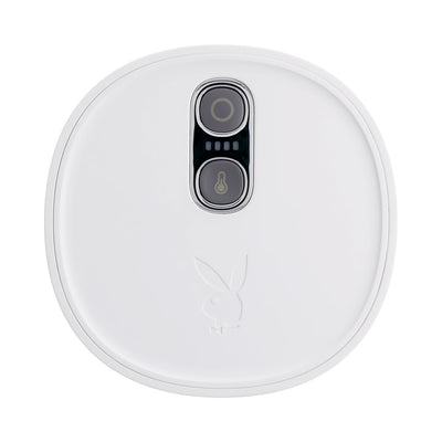 Top view of the white Playboy Twist & Stroke Frost with control buttons and embossed bunny logo.