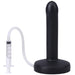 Black slim silicone squirting dildo with attached clear tube and syringe for fluid release.