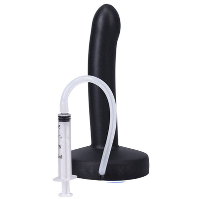 Black slim silicone squirting dildo with attached clear tubing and syringe for fluid release.