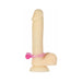 Pink silicone vibrating cockring displayed on a beige phallic model with suction base.