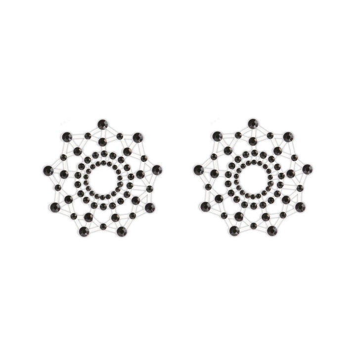 Black gem-studded adhesive nipple covers with a circular, web-like design for a stylish and playful look.