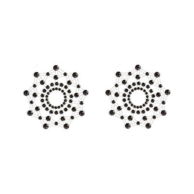 Black gem-studded adhesive nipple covers with a circular, web-like design for a stylish and playful look.