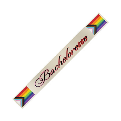 Bachelorette sash featuring the Progress Pride flag colors with elegant script text on a light background.