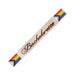 Bachelorette sash featuring the Progress Pride flag colors with elegant script text on a light background.