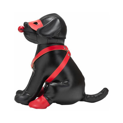 Black leather puppy hood with red eye mask, ball gag, harness, and boots on a dog mannequin in side profile.