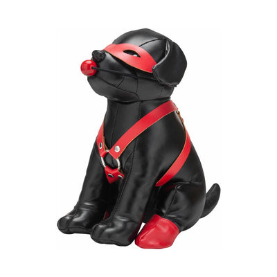 Black leather dog mannequin dressed in red harness, eye mask, ball gag, and red boots on back paws.