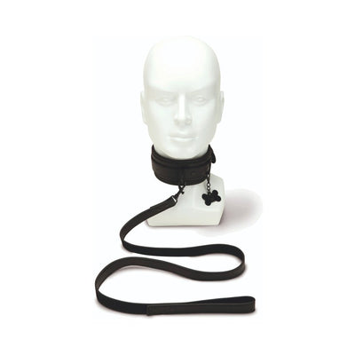 Black faux leather collar with adjustable buckle and bone-shaped charm, paired with matching leash and loop handle on white mannequin head.