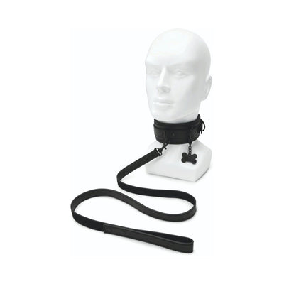Black faux leather collar with bone-shaped charm and matching leash displayed on white mannequin head.