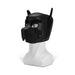 Black neoprene puppy muzzle with ears and snout detail displayed on white mannequin head
