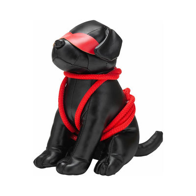 Black leather dog figure blindfolded with red rope tied around its body in decorative bondage style.