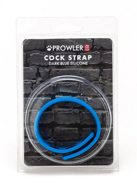 Prowler Red Silicone Cock Strap in dark blue, packaged on a black brick background card.
