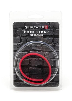 Prowler Red Silicone Cock Strap in clear packaging with black brick background, flexible red silicone ring accessory.