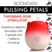 Red and white rose-shaped pulsing stimulator with power button, offering 3 speeds and 7 pulsation patterns for gentle stimulation.