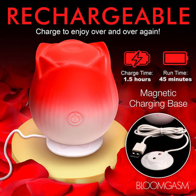 Red and white rose-shaped stimulator on a magnetic charging base with USB cable, highlighting 1.5-hour charge and 45-minute run time.