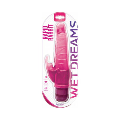 Pink Rapid Rabbit variable-speed vibrator with tickler ears in clear packaging labeled Wet Dreams.