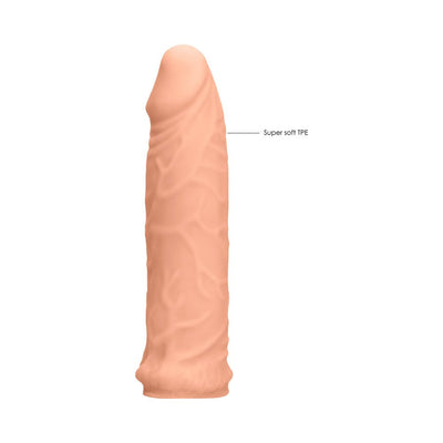Vanilla-colored realistic 7-inch penis extender made of super soft TPE material with detailed texture.