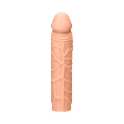 Realistic 7-inch flesh-toned penis extender with textured veins and smooth head design.