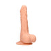Vanilla-colored realistic dildo with detailed texture and attached balls on a suction cup base.