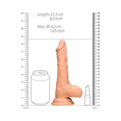 Vanilla-colored realistic dildo with balls, standing next to a soda can and lipstick for size comparison, with measurement scales.