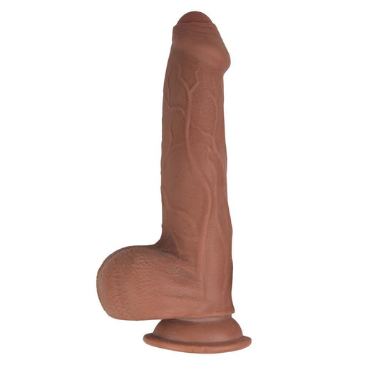 Realistic brown dual-layered uncut dildo with textured veins and suction cup base for hands-free use.