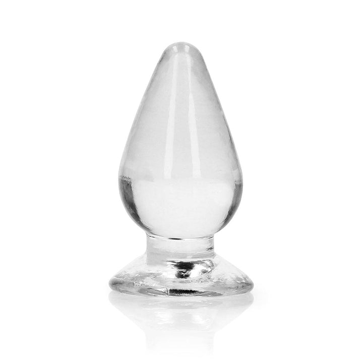 Crystal clear 3.5-inch tapered anal plug with suction cup base for hands-free use, made from body-safe TPE material.