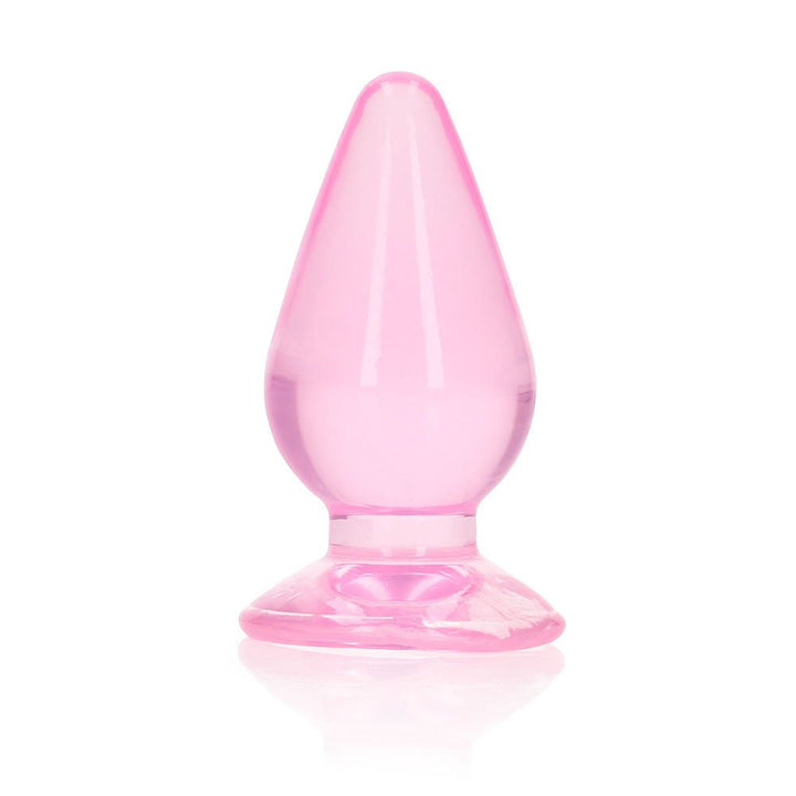 Pink crystal clear 3.5-inch tapered anal plug with suction cup base for hands-free use.