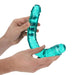 Hands holding a crystal clear teal double-ended dildo with realistic texture and curved design.