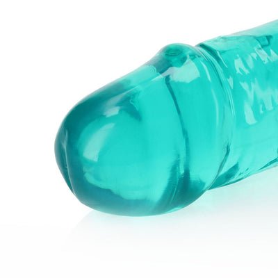 Close-up of the teal crystal clear double-ended dildo tip with smooth, rounded design and textured shaft.