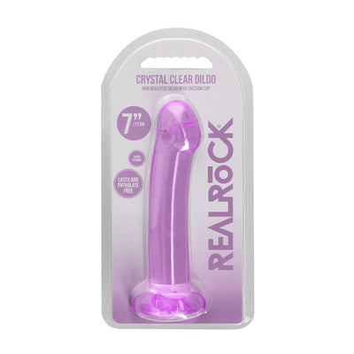Purple crystal clear non-realistic dildo with suction cup in retail packaging by Realrock, 7 inches long