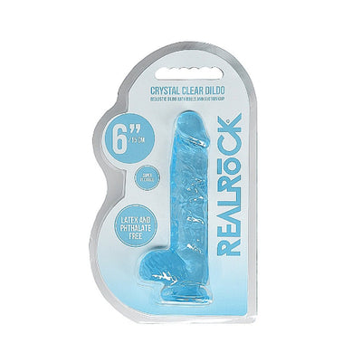Blue crystal clear 6-inch realistic dildo with balls in clear packaging labeled Realrock, latex and phthalate free.